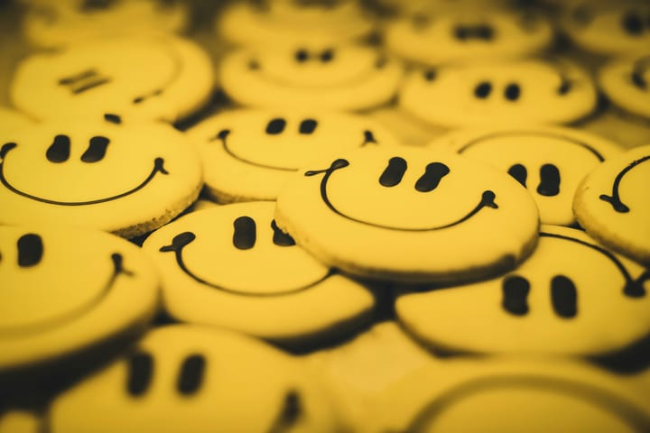 A smile of small discs with smiling faces on them. 