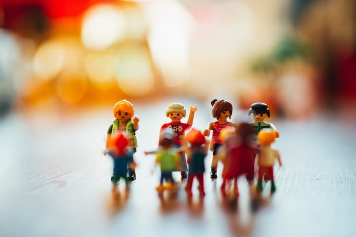 Little lego people on a table. 